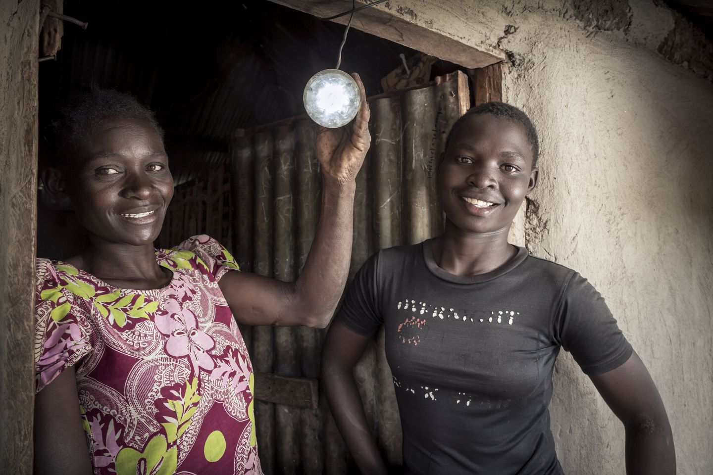 How do grid and off-grid systems enhance or restrict gender equality?